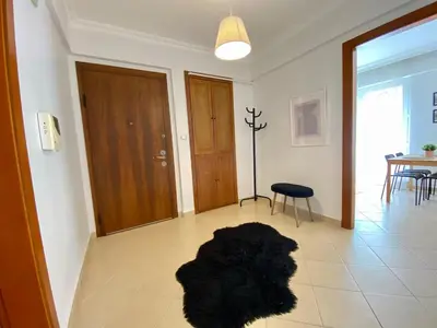 a black rug on the floor of a living room at Central Location 3 Bedroom Flat - No6 in Istanbul
