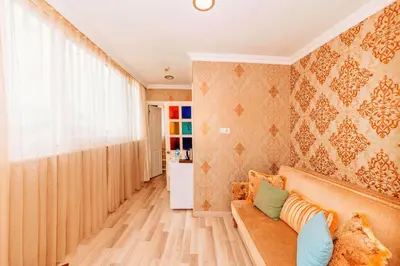 a living room with a couch and a window at Walnut Shell Hotel in Istanbul