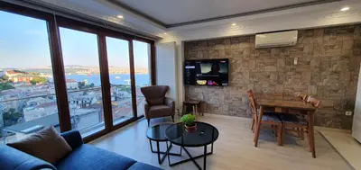 a living room with a couch and a table at Taksim Flat in Istanbul