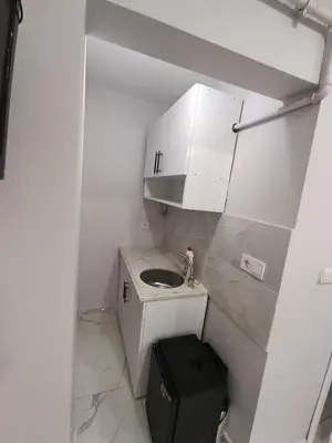 a small bathroom with a sink and a toilet at BlueRoyal Home Sultanahmet in Istanbul