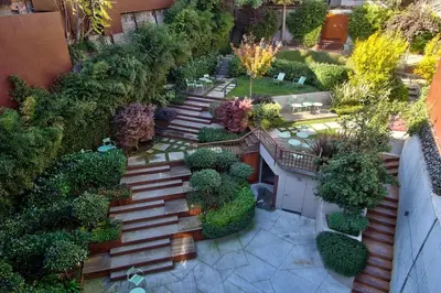 an overhead view of a garden with stairs and plants at Beyoglu Hacımimi Gardens içinde özel bahçeli daire in Istanbul