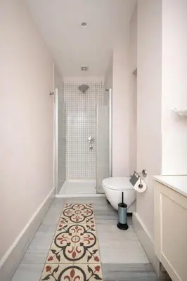 a bathroom with a tub and a toilet and a sink at Galata Maison by Guest Teori in Istanbul