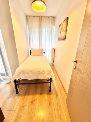a small bedroom with a bed in a room at New apartment in the center of Istanbul near Istiklal in Istanbul