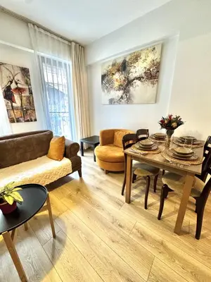 a living room with a couch and a table at New apartment in the center of Istanbul near Istiklal in Istanbul