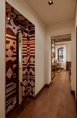 a room with a wall with cow cut outs at Castellion Hotels Galata in Istanbul