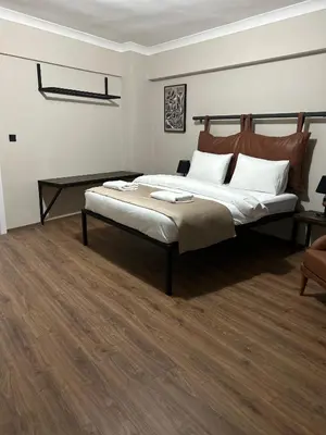 a bedroom with a large bed in a room at Pera Line Yalova in Yalova