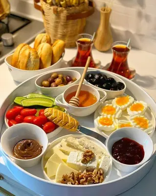 a tray filled with different types of food on a table at H-mak AIRPORT OTEL in Arnavutköy