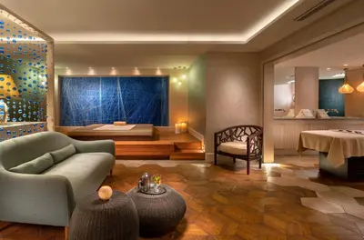 a living room with a bed and a couch at Crowne Plaza Florya Istanbul by IHG in Istanbul