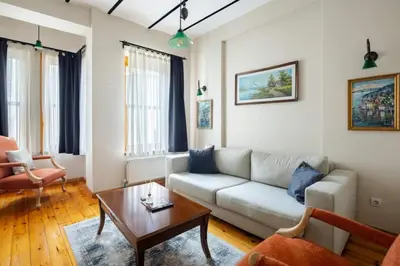a living room with a couch and a coffee table at Cool Authentic 2BD2Bath Galata Tower Home! #413 in Istanbul