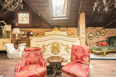 a room with two chairs and a table and a couch at NOLD Suite in Istanbul