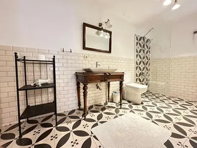 a bathroom with a sink and a toilet at Nefes Ada Taş Bina - Bahçe Katı in Istanbul