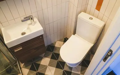 a bathroom with a white toilet and a sink at Hill House Hostel in Istanbul
