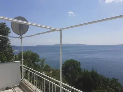 a view of the ocean from a house at Art & Natura in Marmara