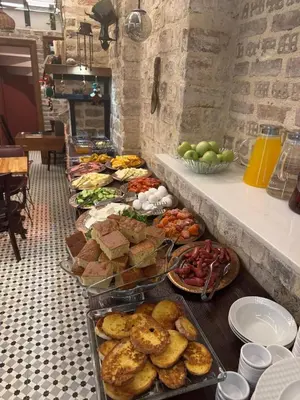 a buffet line with many different types of food at Veva flats hotel in Istanbul