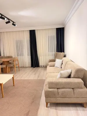 a living room with a couch and a table at Luxury Apartment In A Great Location 10 in Istanbul