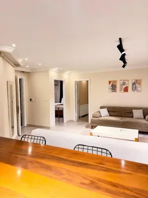a living room with a large bed and a couch at Great Location Terrace Apartment 15 in Istanbul