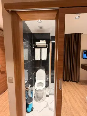 a bathroom with a toilet in a room at city istiklal in Istanbul