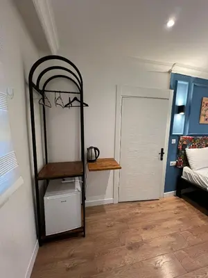 a room with a bunk bed and a shelf at taksimrosboutique in Istanbul
