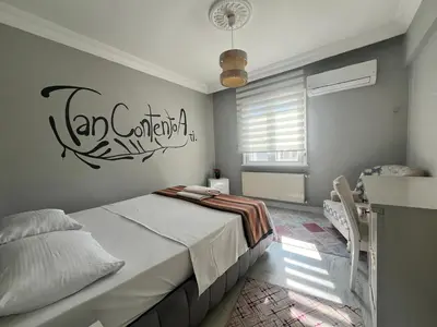 a bedroom with a bed with a sign on the wall at Mansion with private pool in Sapanca in Sapanca