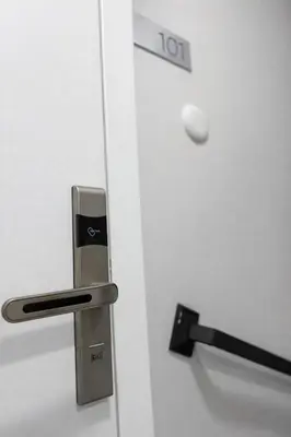a door with a handle on a white door at Signature Suites in Taksim in Istanbul