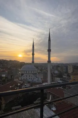 a view of a mosque with two minarets on top at Signature Suites in Taksim in Istanbul