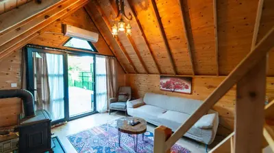 a living room with a couch and a table at Regulus Sapanca in Sapanca