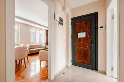 a door in a hallway with a living room at Samuray in Istanbul