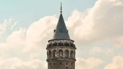a tower with a steeple on top of a building at Heart of Pera by Allyon Suite Hotel in Istanbul