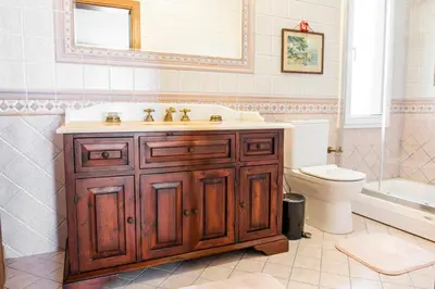 a bathroom with a sink and a toilet at Terrazzo Sapanca - Isıtmalı Havuzlu Villa Süha Fazlı in Sapanca