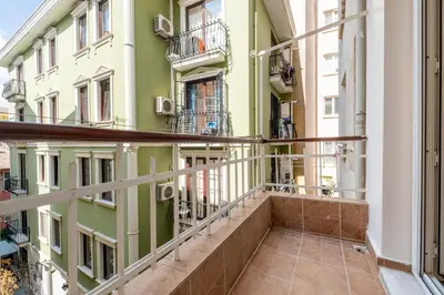 a balcony of a building with green walls at 3-Bedroom 2-Bathroom, Centrally Located Ground-Floor Apartment -No Stairs in Istanbul