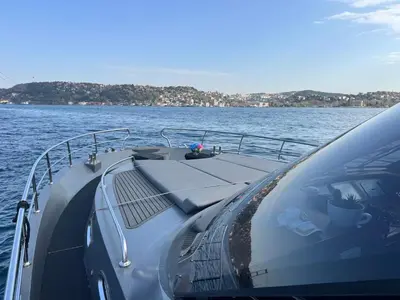 a boat in the water with a car on it at Boat BOSPHORUS in Istanbul