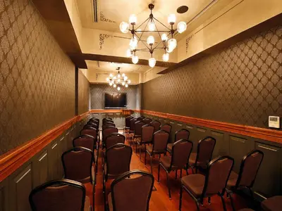 a room with a row of chairs in a room at Sanat Boutique Hotel Pera in Istanbul