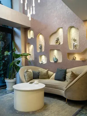 a living room with a couch and a table at Actuel Life Hotel in Istanbul