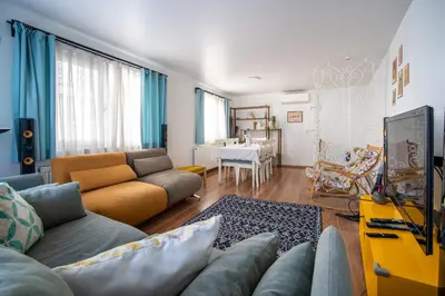 a living room with a couch and a table at Unique 4-Level Home in the Heart of Beşiktaş in Istanbul