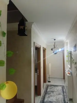 a room with a hallway with a light on the ceiling at Sağlam Apartments 1 in Istanbul