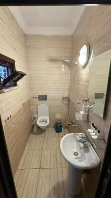 a bathroom with a sink and a toilet at Sophia bukalemoon apartment in Istanbul