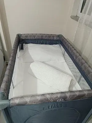 an open suitcase with a white pillow in it at Apartment with a View Taksim-Beyoğlu1 in Istanbul