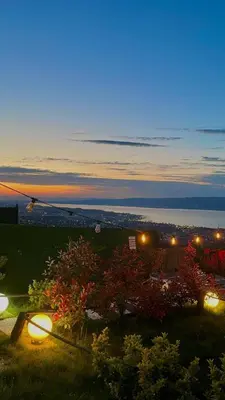a view of a garden at night with lights at Sapanca Liva Bungalov in Sapanca