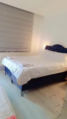 a large bed in a room with at Üsküdar Sahil Konaklama in Istanbul