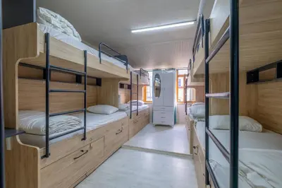 a bedroom with bunk beds in a tiny house at Çatal hostel in Istanbul