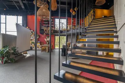a lobby with a staircase in a building at Baraka 1 in İznik