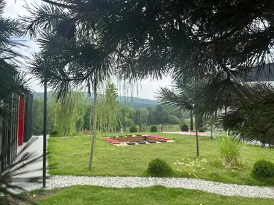 a park with a picnic table in the grass at Baraka 2 in İznik
