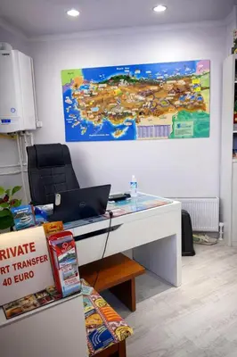 an office with a desk with a laptop on it at Hes Sultanahmet Tenedos in Istanbul