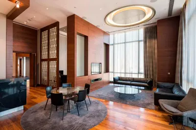 a living room with a couch and a table at Sheraton Grand Istanbul Atasehir in Istanbul