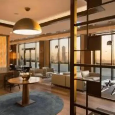 a living room with a couch and a table at Sheraton Grand Istanbul Atasehir in Istanbul
