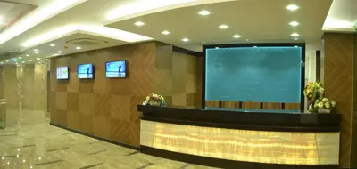 a large screen in the lobby of a hotel at Görükle Güler Park Hotel in Gorukle