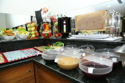a kitchen with bowls of food on a counter at Golden Lounge Hotel in Istanbul