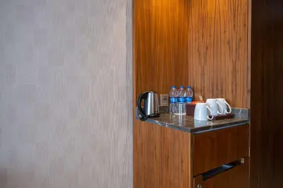 a counter in a room with bottles of water at Clarion Hotel Istanbul Mahmutbey in Istanbul
