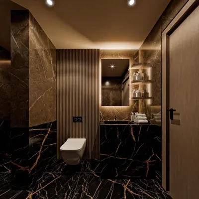 a bathroom with a toilet and a sink at Grand Cevahir Hotel Convention Center in Istanbul