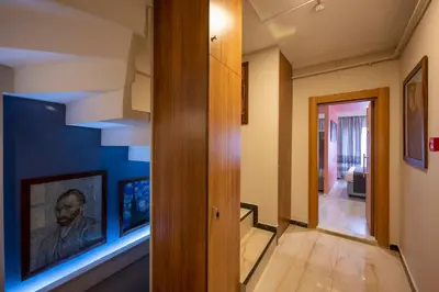 a hallway with a staircase in a house at Marida Suit - Istanbul Taksim in Istanbul